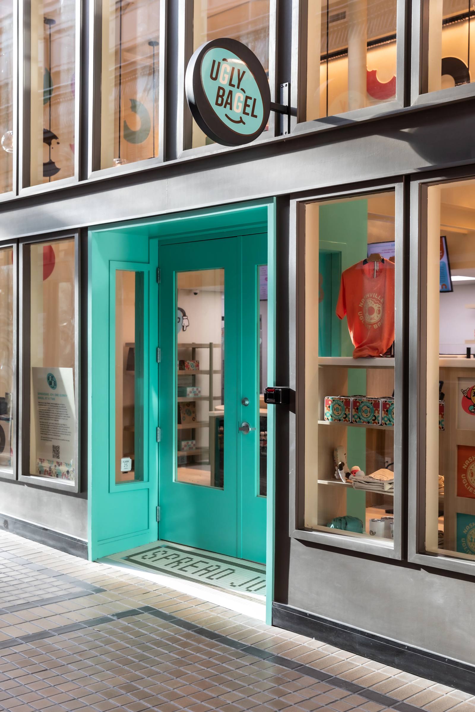 Aqua Ugly Bagel storefront entrance